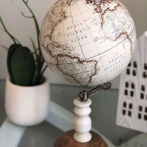 modern globe, neutral colors, wooden detail